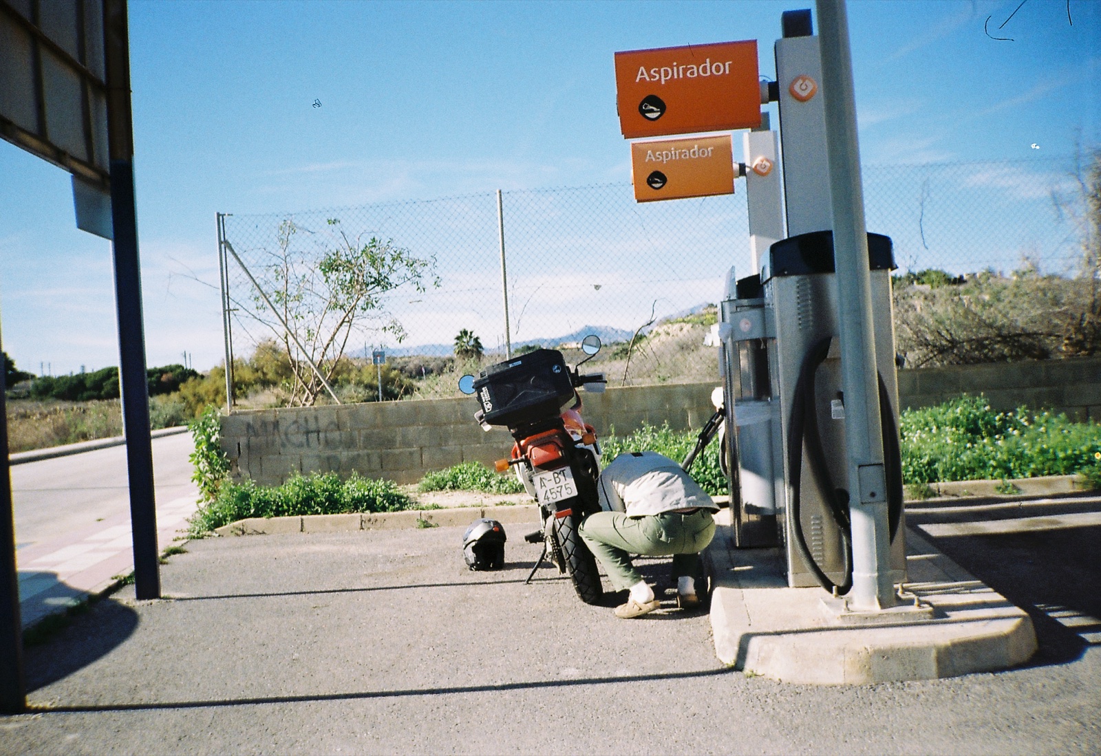 Filling air on the Transalp at a Spanish petrol station
